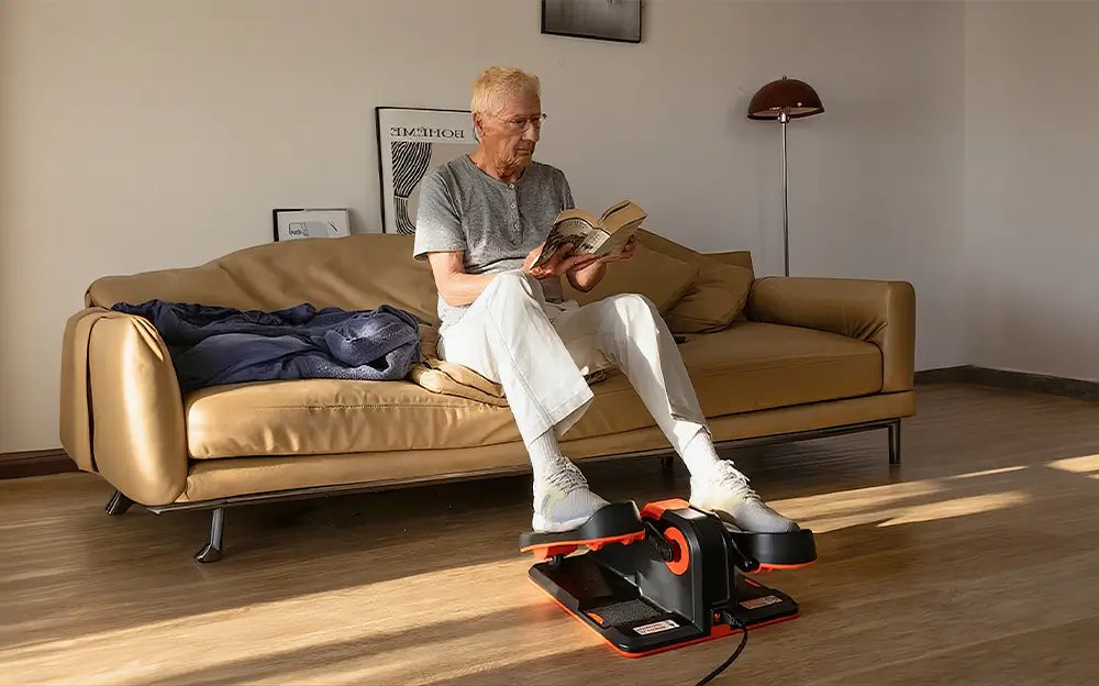 Senior using Tousains elliptical in small apartment