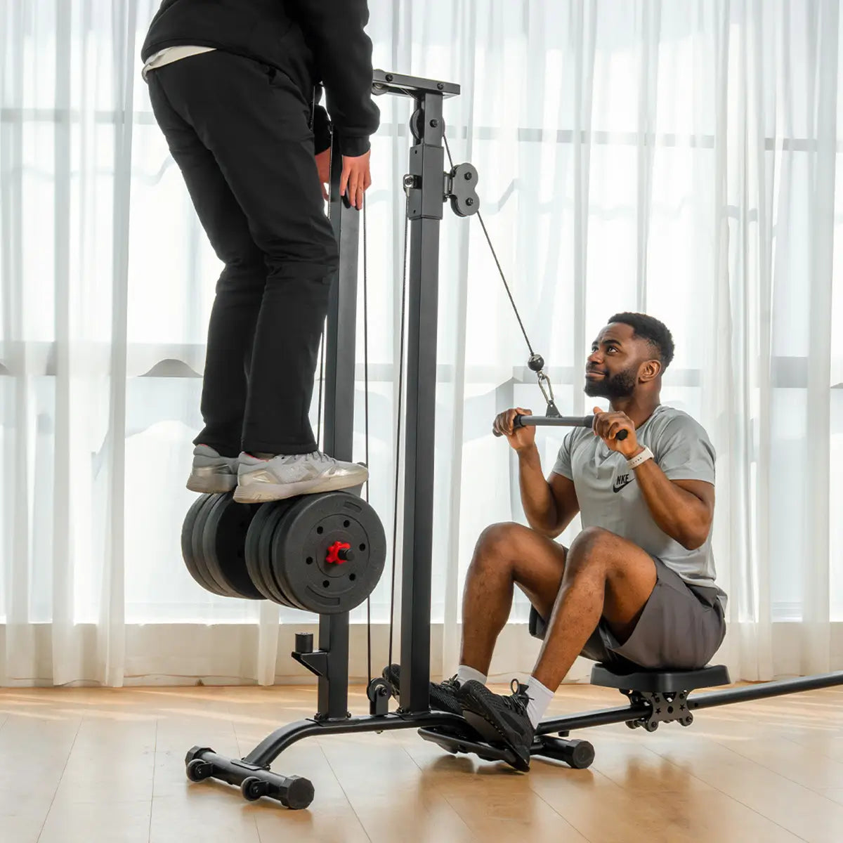 Together with your friends to create an engaging workout with Tousains LAT Pulldown Machine
