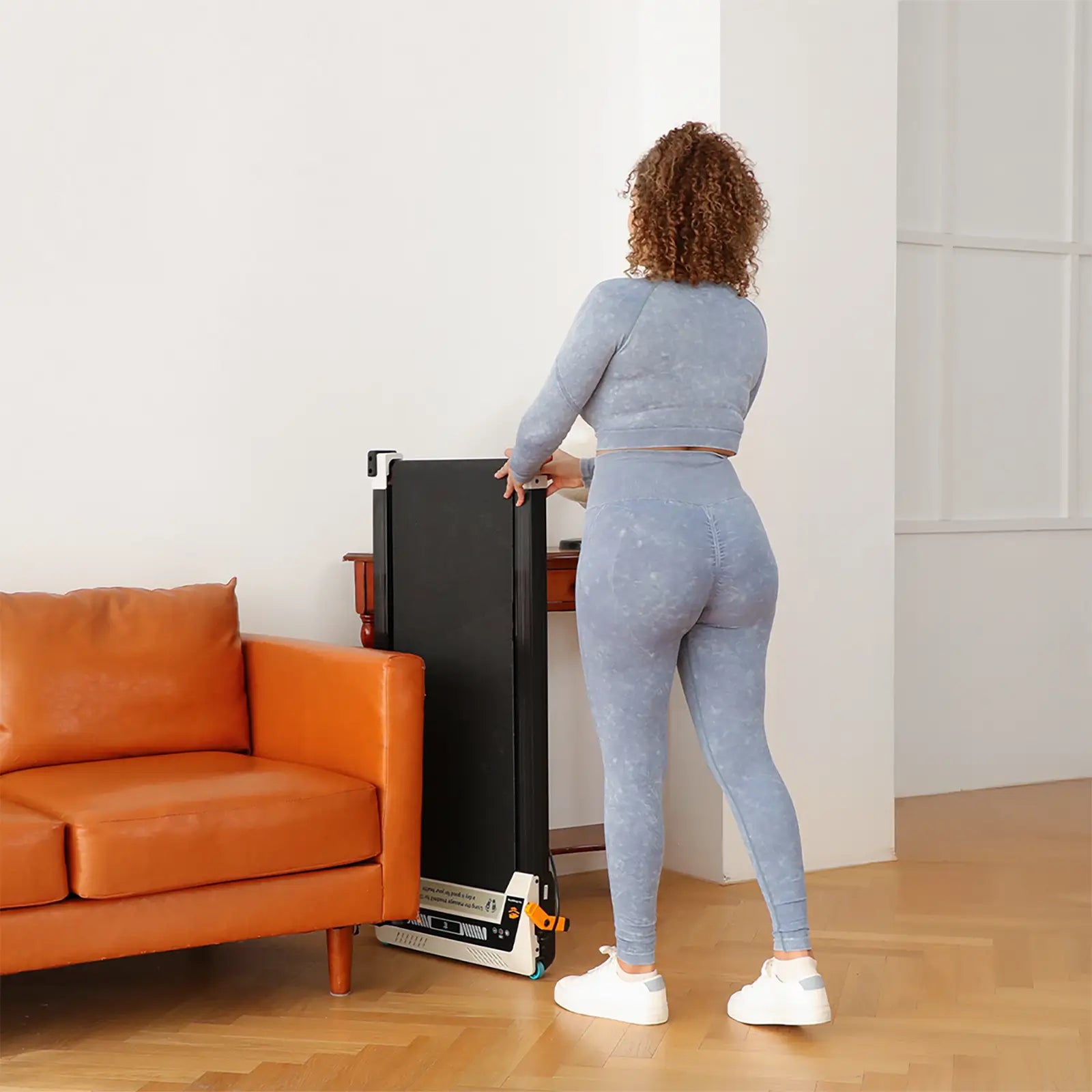 Tousains compact treadmill for small spaces can be placed in any corner of your apartment.